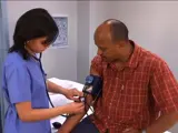 Doctor checks a man's vital signs