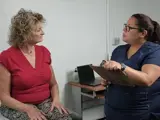 Nurse gets a woman's medical history