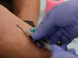 nurse performs a venipuncture